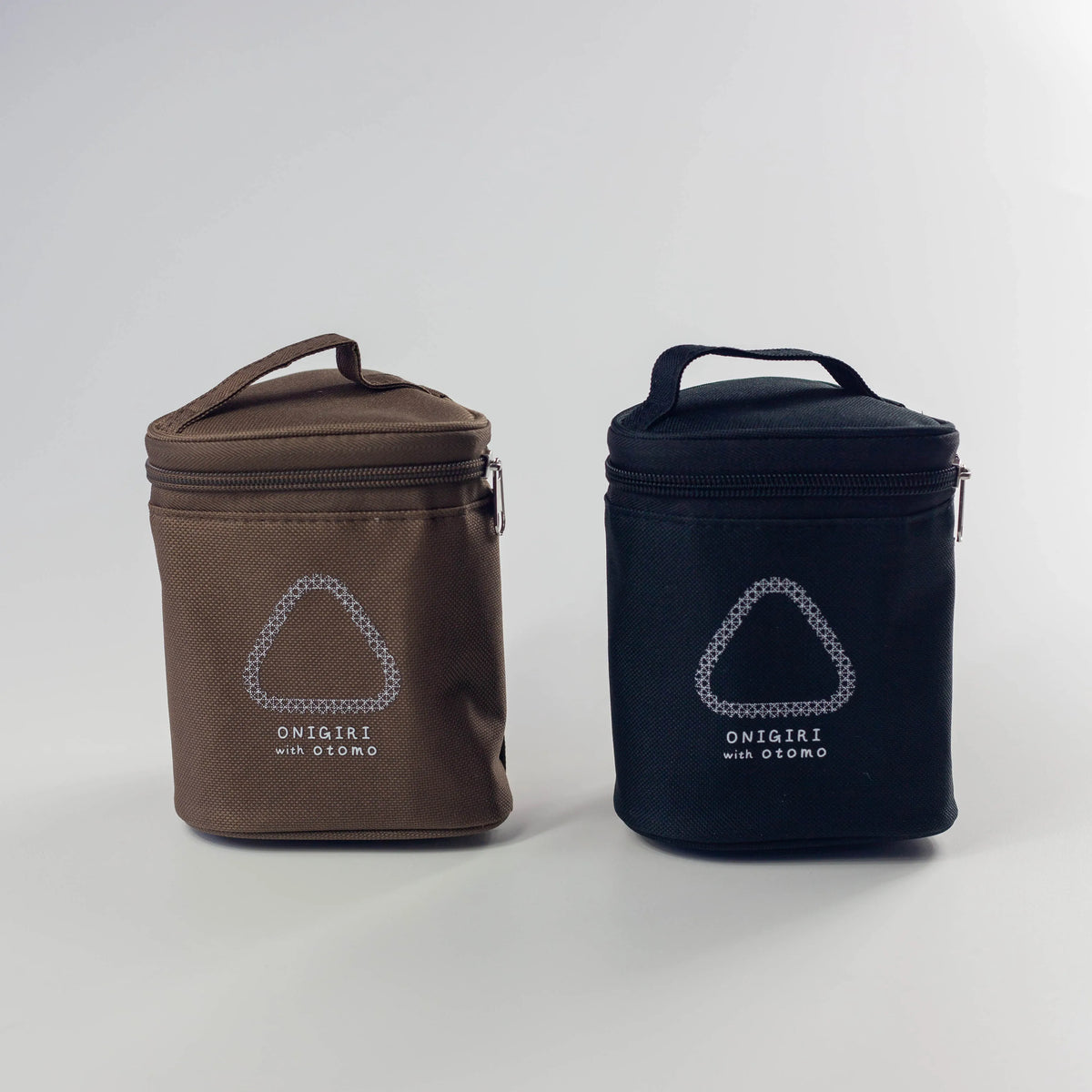 Otomo insulated onigiri lunch bags in brown and black with side dish containers