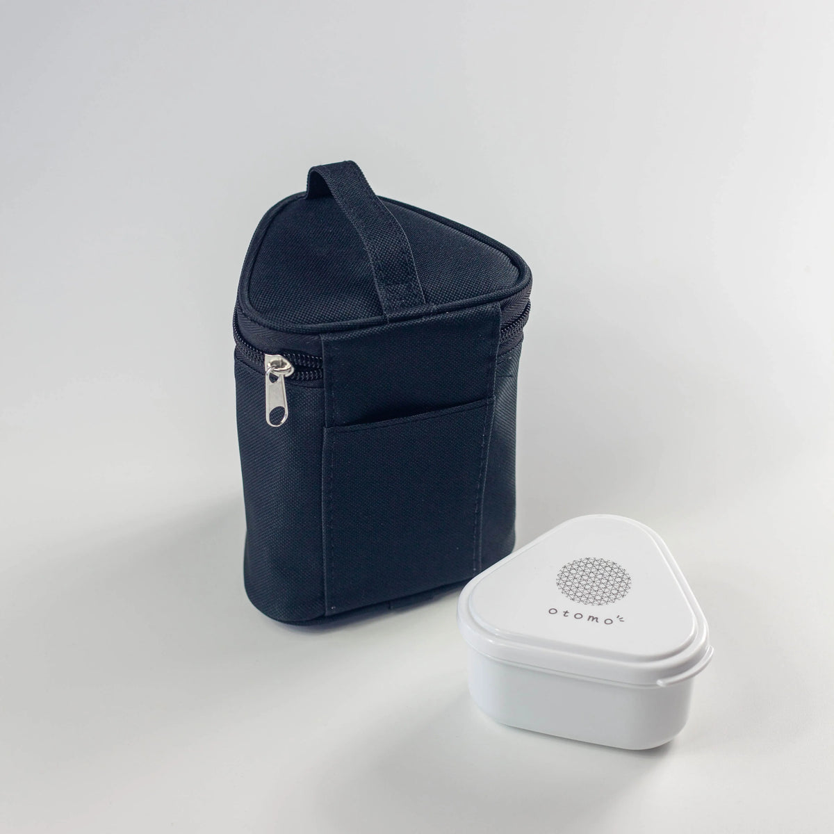 Otomo insulated onigiri lunch bags in brown and black with side dish containers