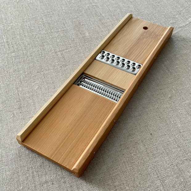 Handcrafted Kyoto bamboo mandoline slicer with a stainless steel blade