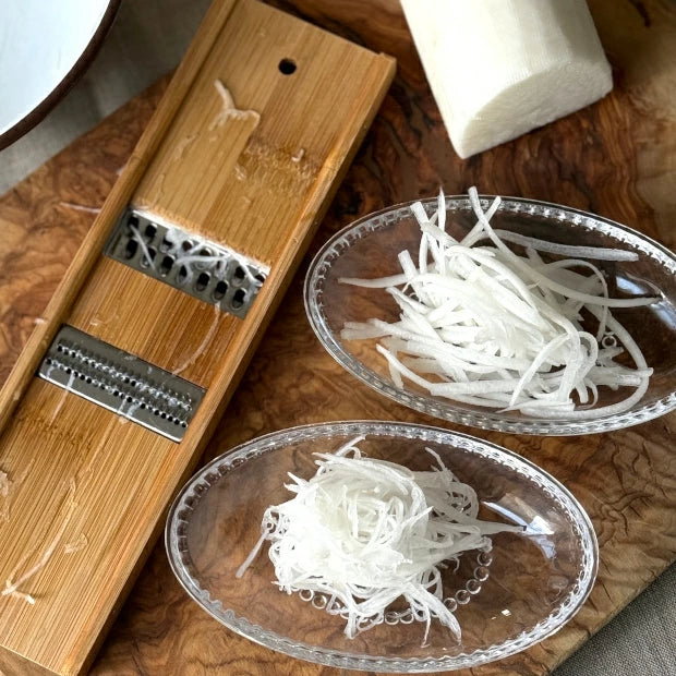 Handcrafted Kyoto bamboo mandoline slicer with a stainless steel blade