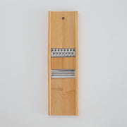 Handcrafted Kyoto bamboo mandoline slicer with a stainless steel blade