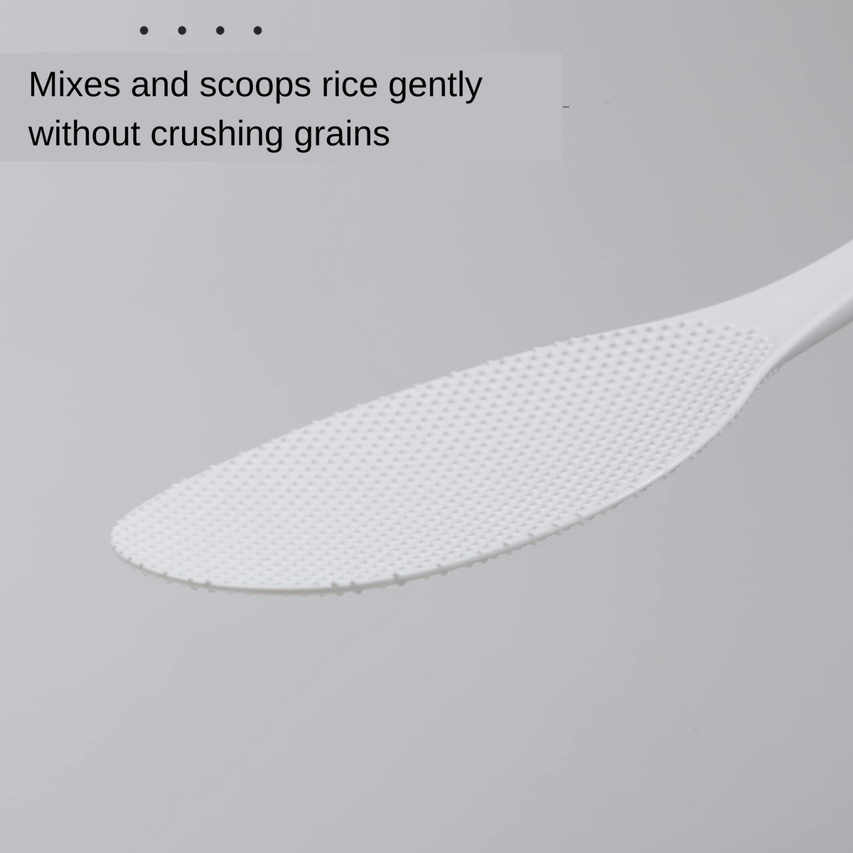 Close-up of Marna Rice Paddle's thin flexible blade – mixes and scoops rice gently without crushing grains