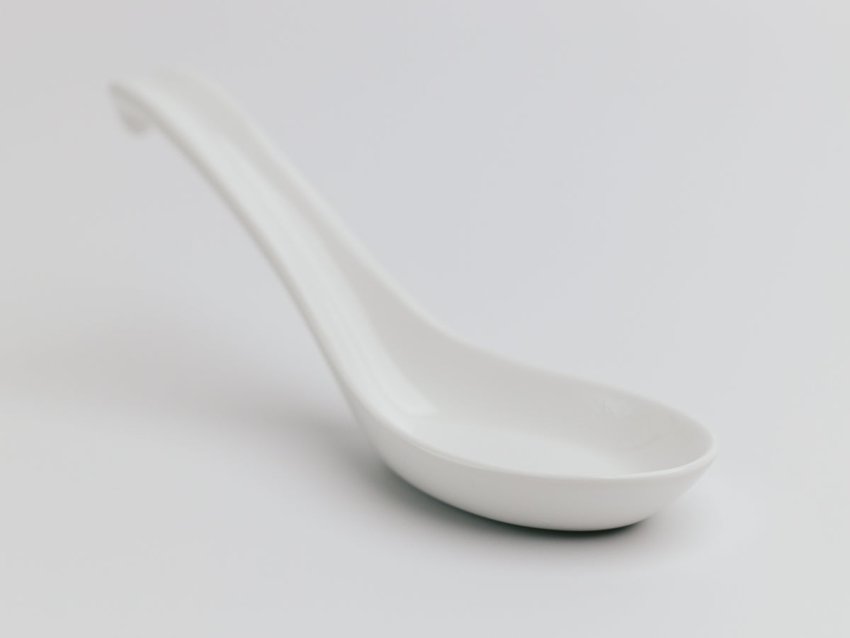 Porcelain Ramen Spoon – front view of deep bowl and curved neck, matte white finish on grey background