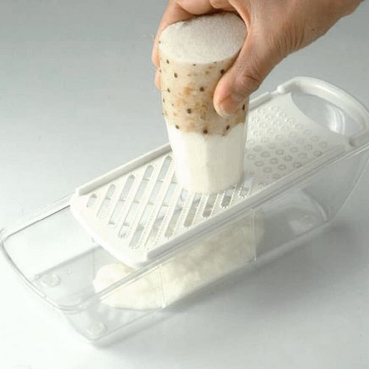 Mandoline Slicer Set with 4 interchangeable blades, peeler, and storage tray