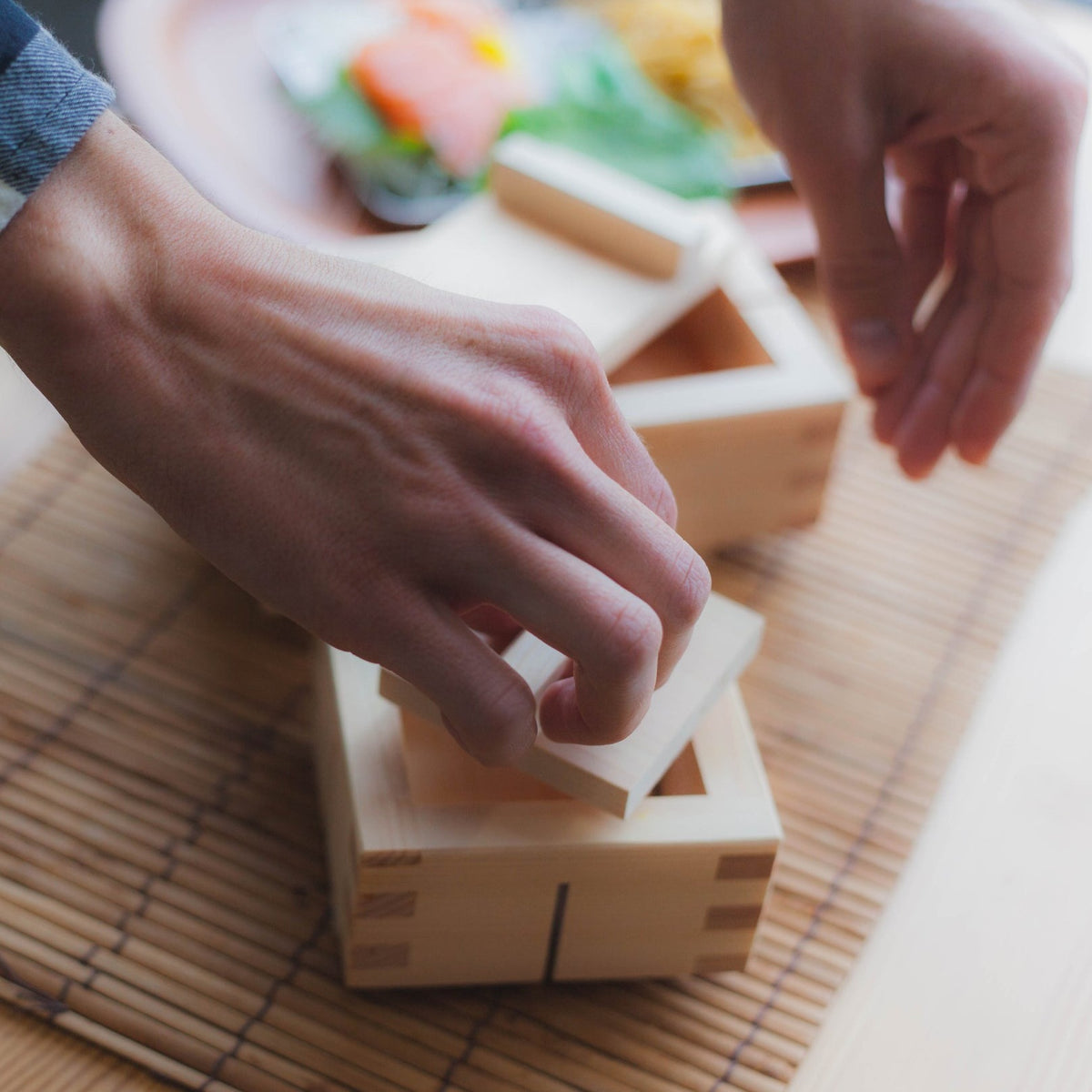 Using the Sushi Mold Small Square to press seasoned rice and toppings into perfect bite-sized pieces