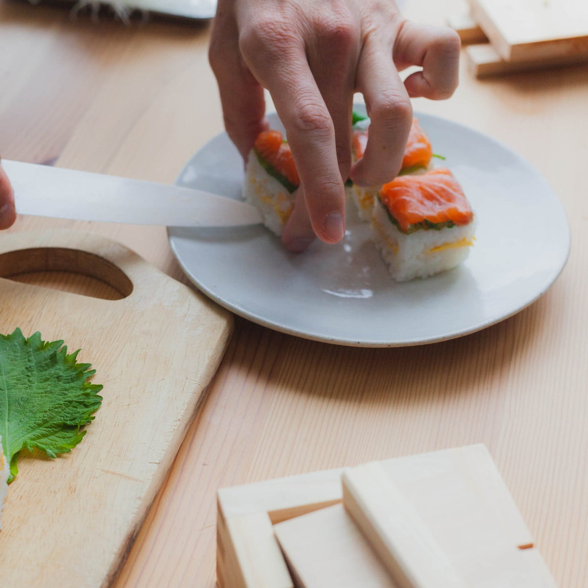 Using the Sushi Mold Small Square to press seasoned rice and toppings into perfect bite-sized pieces