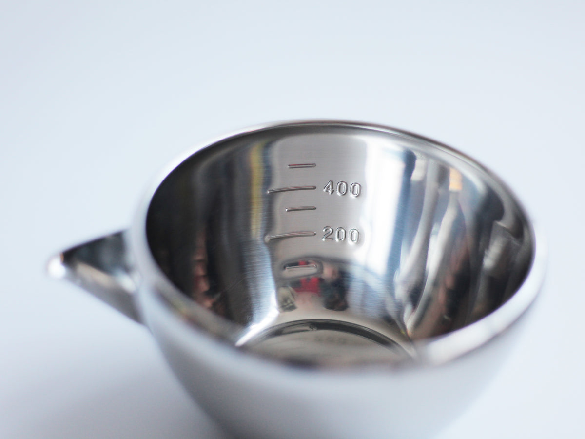Katakuchi Mixing Bowl 700mL – polished stainless steel with pouring spout, white background