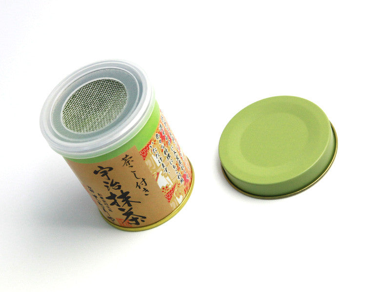 Chikiriya Uji Matcha Green Tea Powder tin can with the green outer lid removed, revealing the built-in mesh sifter lid, on white background